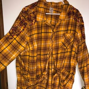 Long sleeve, button up shirt.